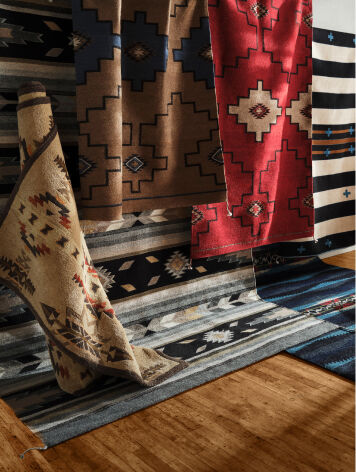 Pendleton rugs rolled and laid flat