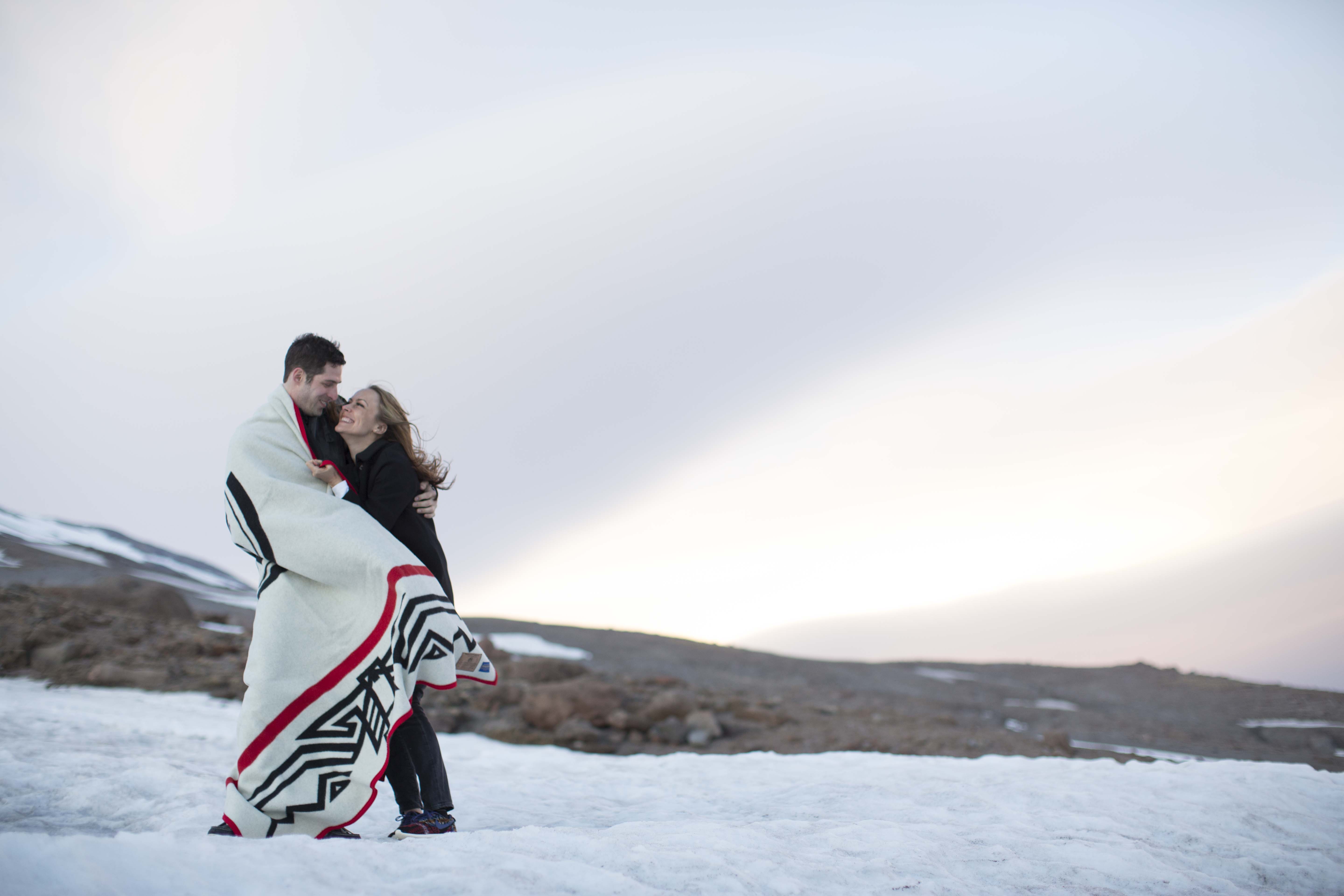 Couple on the slopes of Mt. Hood in a Pendleton blanket