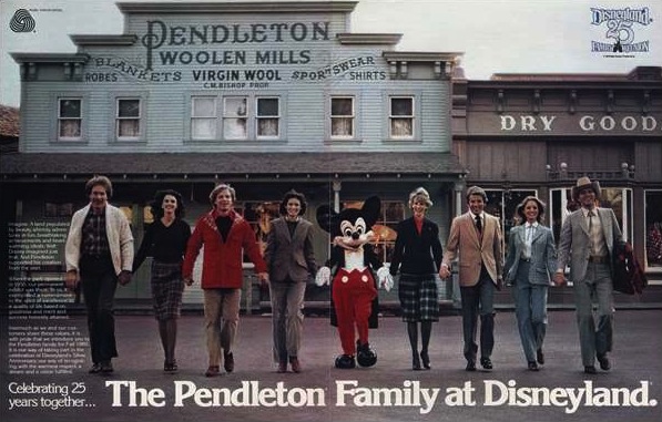 A line of models posed in front of the Pendleton store in Frontierland wearing Pendleton clothing (Mickey in the center)