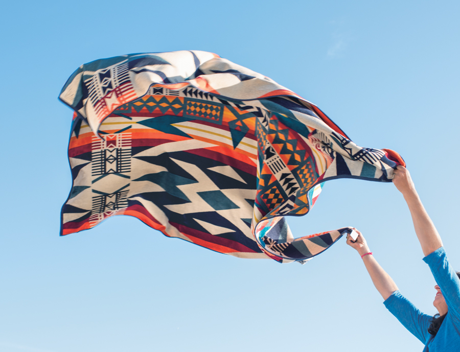 The Fire Legend towel-for-two against a blue sky.