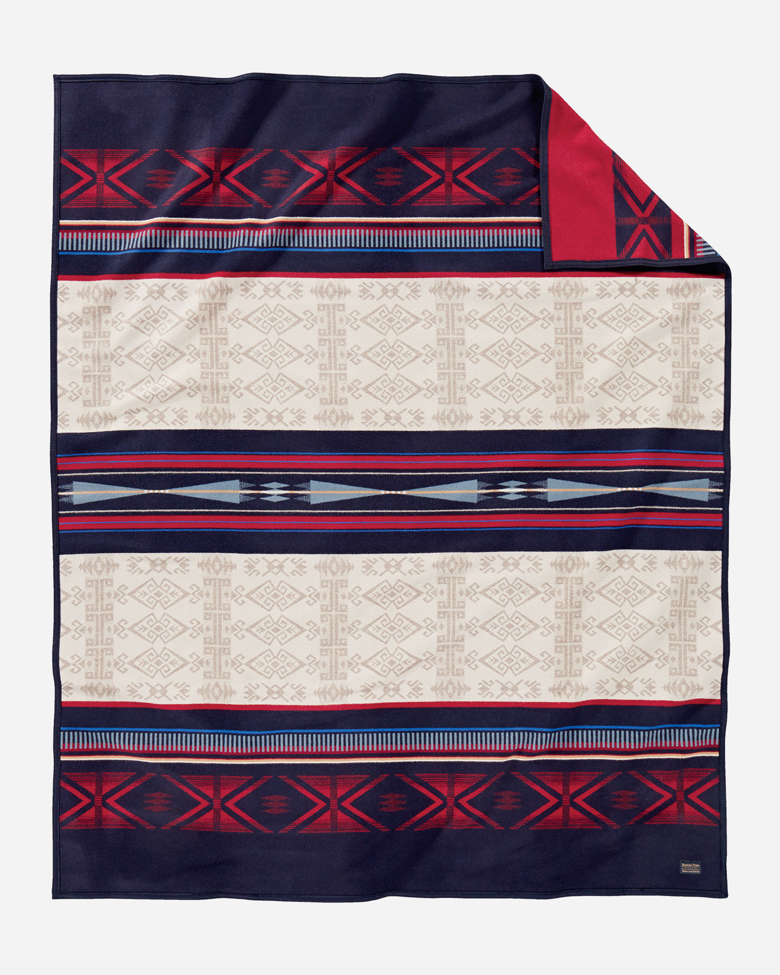 The Bighorn blanket, by Pendleton Woolen Mills. This design is a geometric pattern of navy blue, red, and tan.