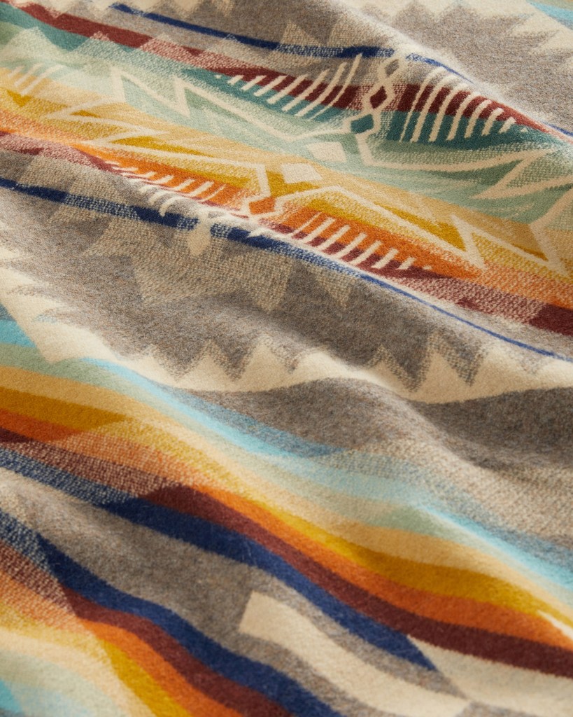 A closeup of the Summerland blanket by Pendleton, showing the dragonfly motif.