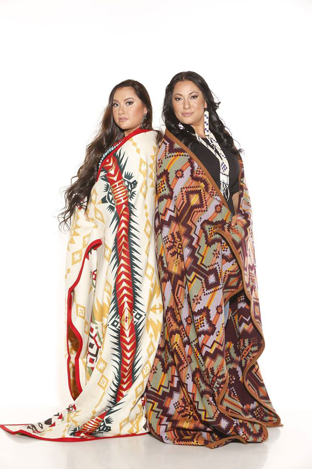 Mother and daughter wrapped in Pendleton blankets