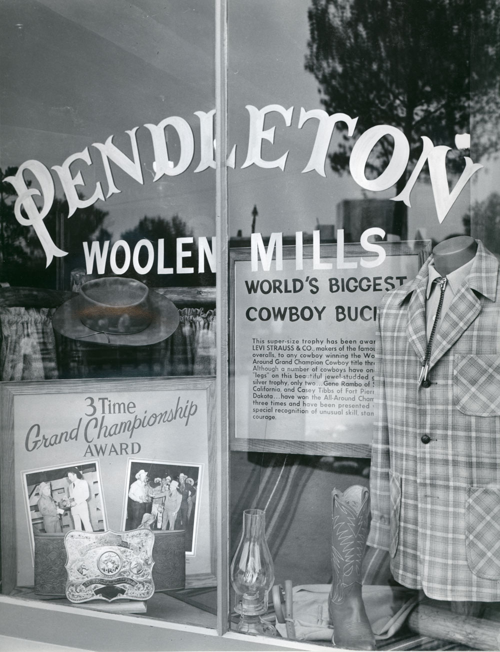 A photo from the Pendleton archives of the Pendleton store in Disneyland: Side window display featuring the Wold's Biggest Cowboy Buckle