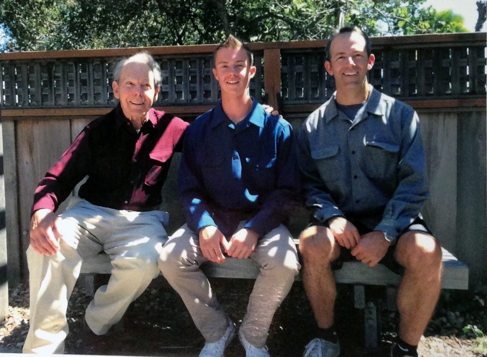 Three generation of men from the Smith family in their Pendleton shirts. 