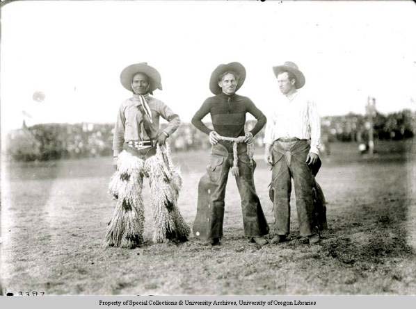 Jackson SUndown poses with felloe rodeo champions in a historical photo that's part of the University of oregon archives.