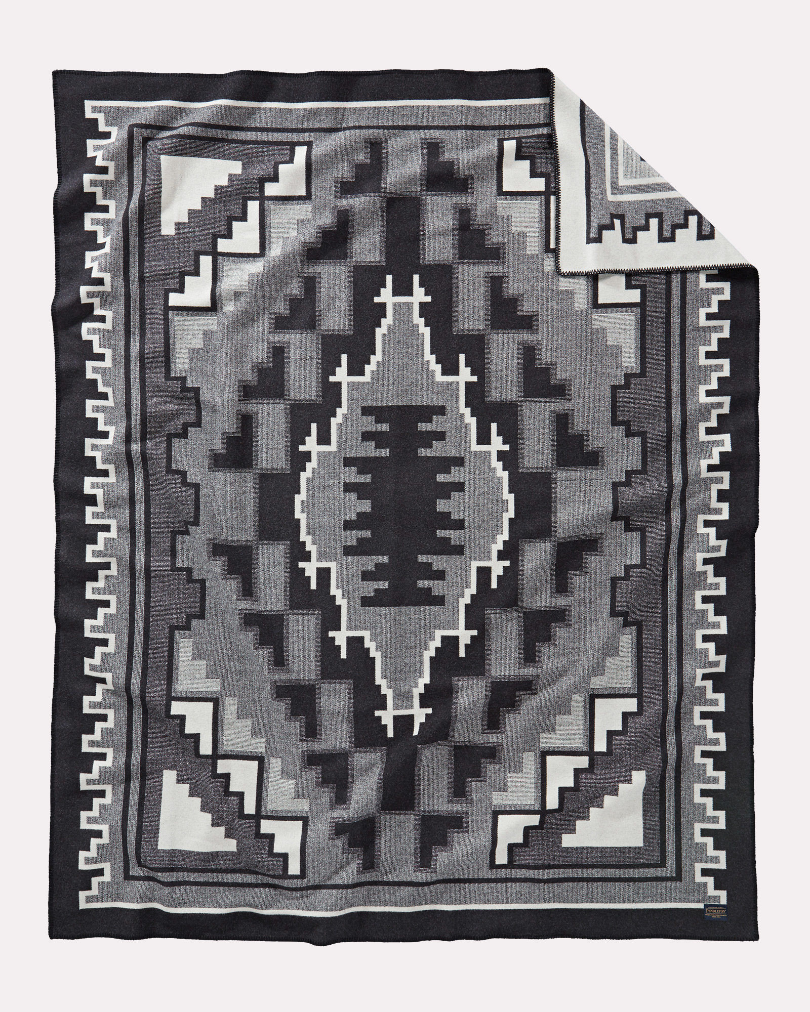 Pendleton Weavers Series #2, by mary Henderson, a black and white blanket.