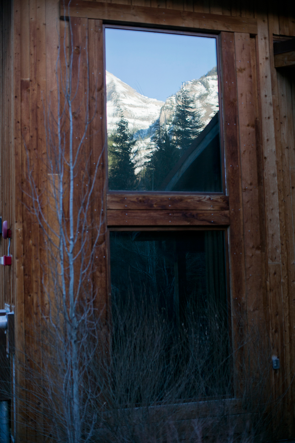 The mountains reflected in a window