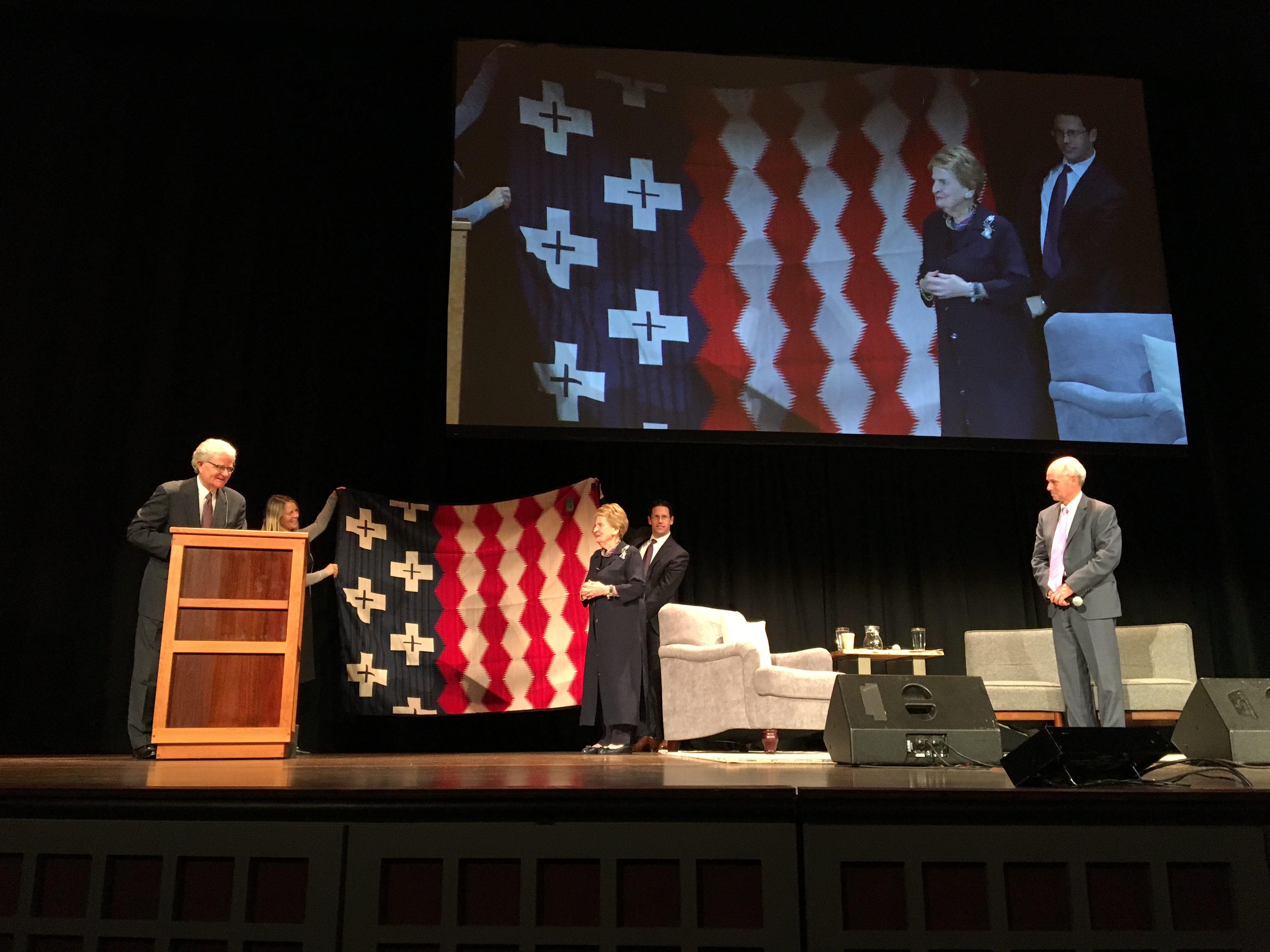 Madeline Albright onstage at Portland's Arlene Schnitzer Center for the Performing arts, receiving a Pendleton Brave Star blanket