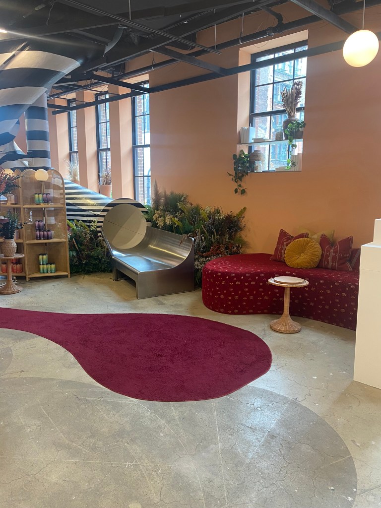 Lounging area and a fun slide inside Showfield's.