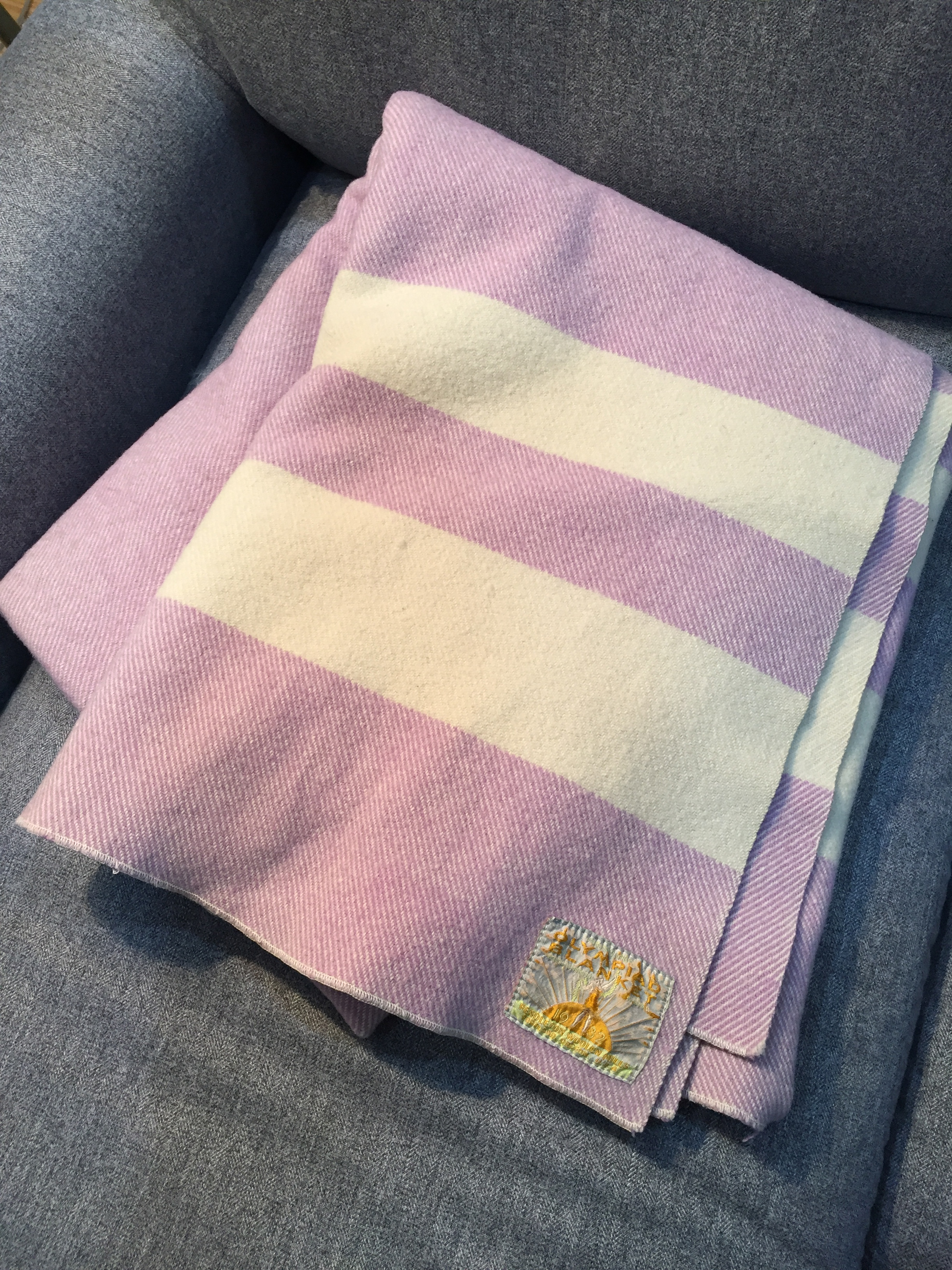 A beautiful Pendleton Olympiad blanket in lavender, with a twill weave and an embroidered label. 