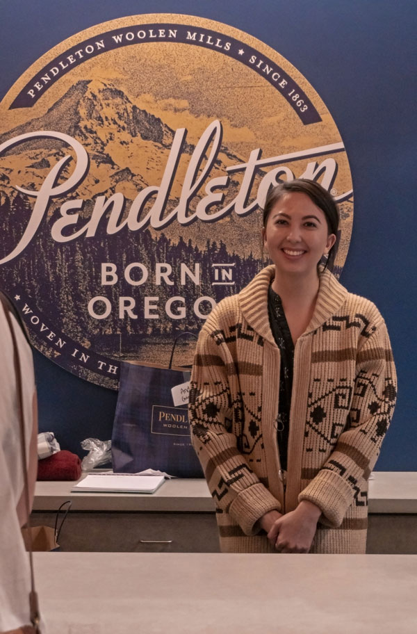 A sales associate at the Pendleton store at #DudeCon