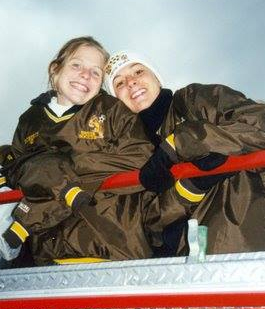 Two young, smiling girls on a field trip to Yellowstone Park. 