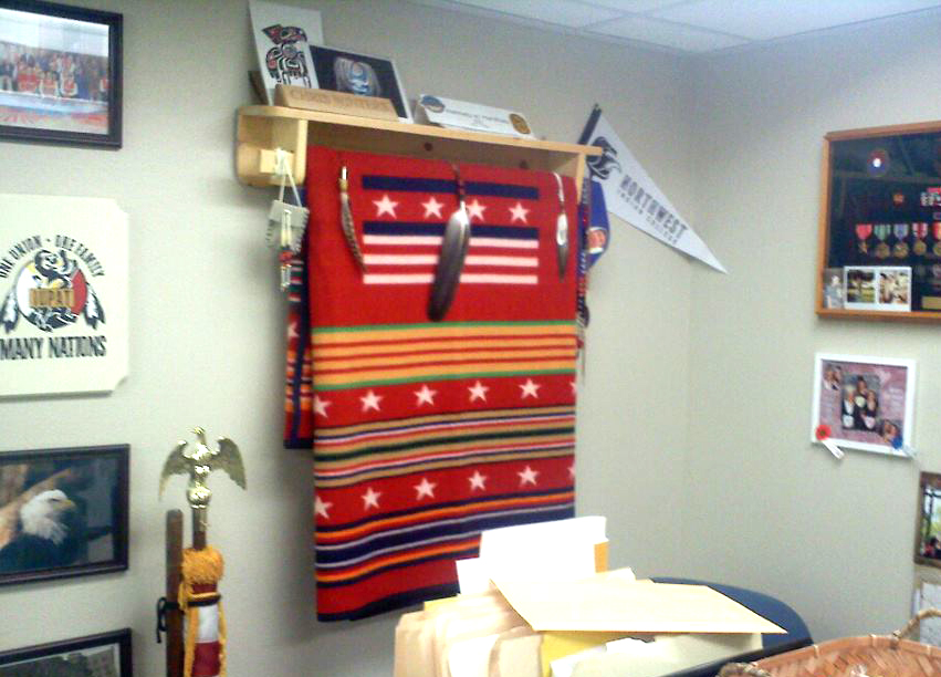 A Grateful Nation blanket hangs in the UPAT offices, which provides outreach and community to Native American veterans.