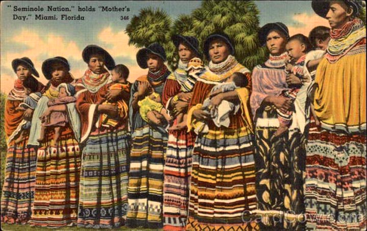 Vintage tourist postcard of Seminole people in strip clothing