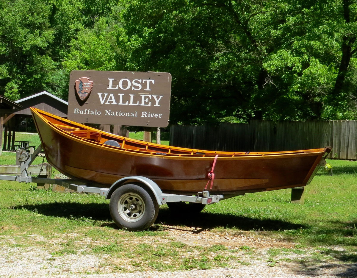 Greg Hatten's wooden boat on the trailer at the entrance to Lost Valley, before he takes on the Buffalo River.