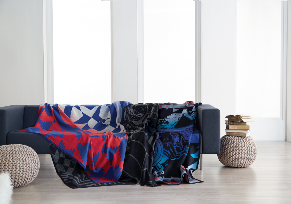 The aMarvel blankets on a sofa.