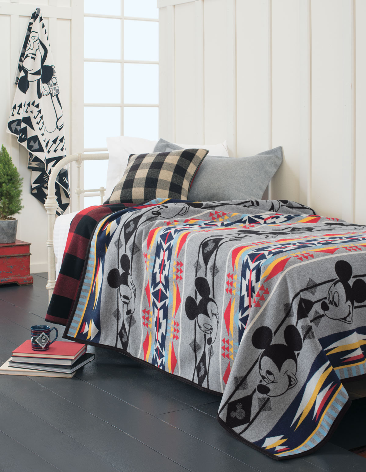 Pendleton Mickey Mouse blanket on a bed.