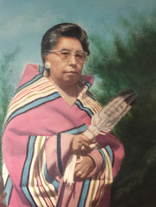 A painting of a woman wearing a striped Pendleton blanket, holding a feather fan. Artist unknown.