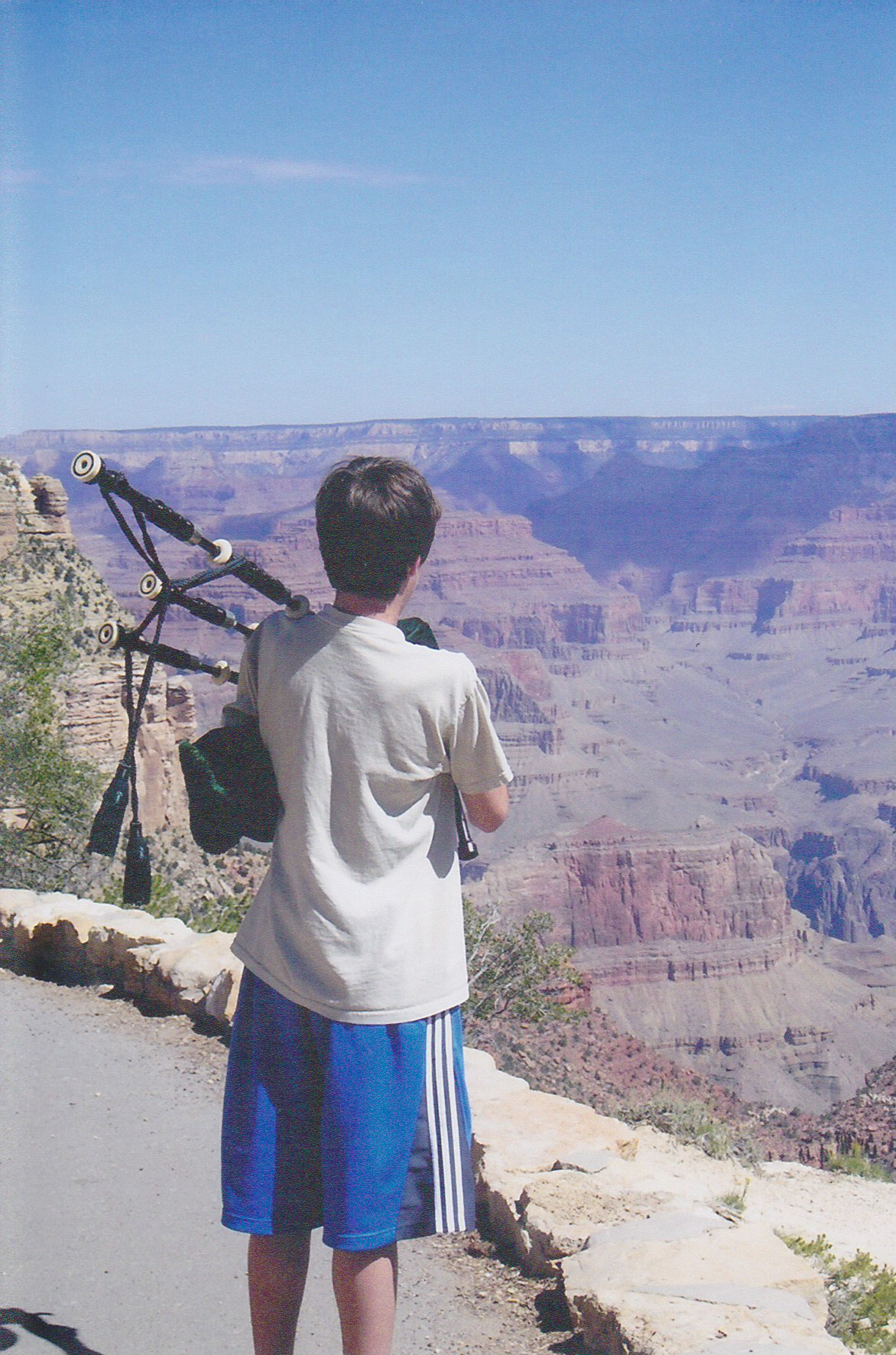 Kyle plays his bagpipes at the rim of the Grand Canyon