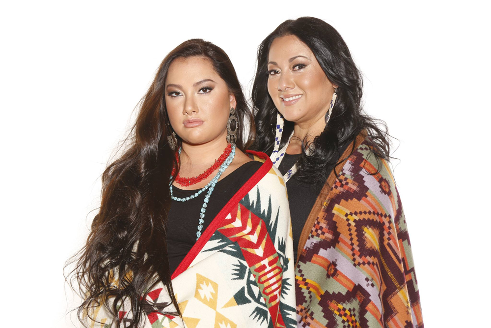 Mother and daughter wrapped in Pendleton blankets