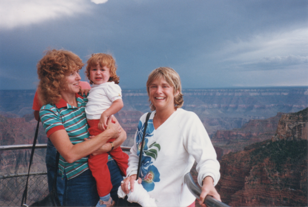 A 1980s photo of two women and a crying toddler at the Grand Canyon