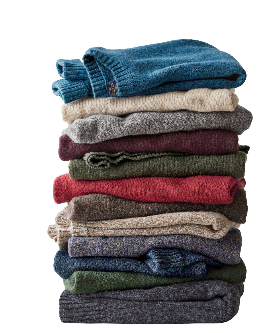 stack of folded men's Shetland sweaters by Pendleton