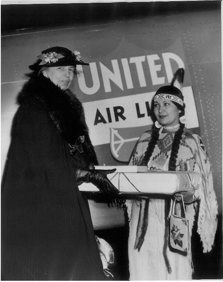 First Lady Eleanor Roosevelt accepts a Pendleton blanket (about 1941).