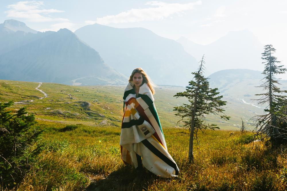 Irey_A woman wrapped in a Glacier blanket at Glacier Park