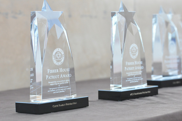 Photo shows three crustal trophies given by the Fisher House Foundation as their "Patriot Award"