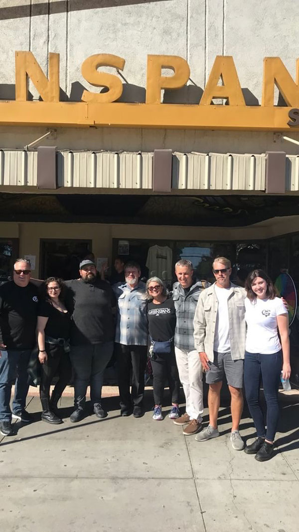 Members of Greenspan's crew and Pendleton celebrate together.