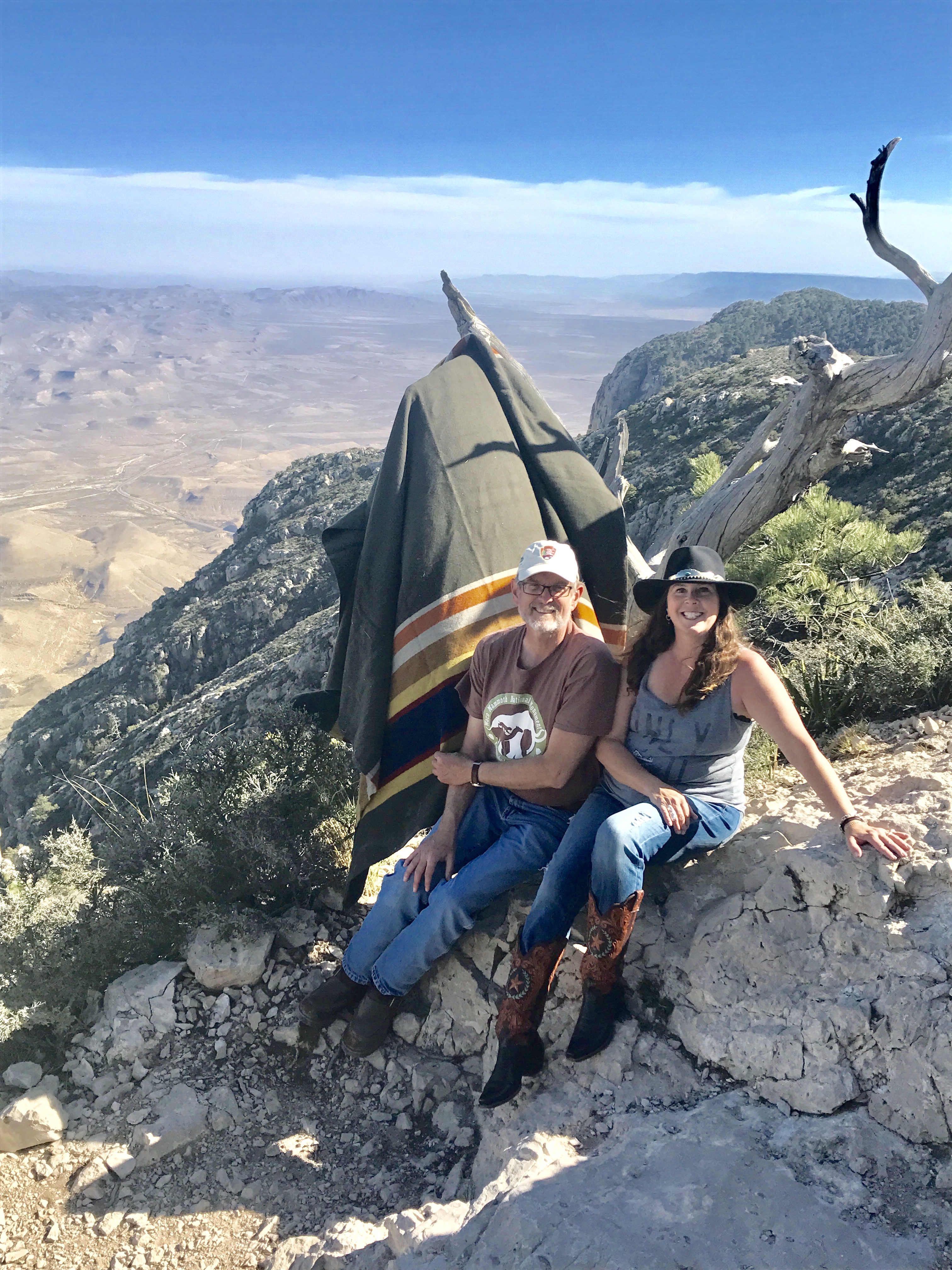 The Poets laureate of Anerica's National parks pose with a Pendleton Badlands blanket at the Badlands in North Dakota.