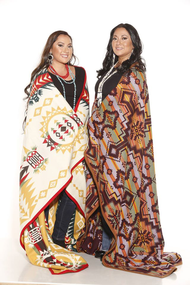 Mother and daughter wrapped in Pendleton blankets