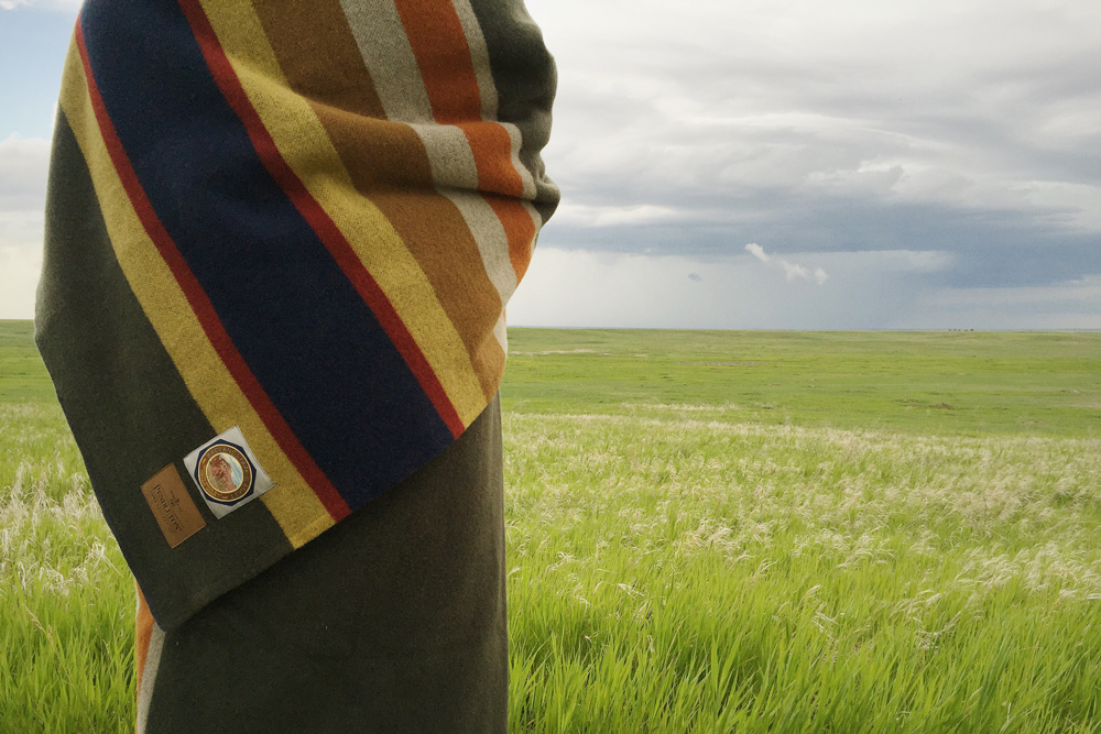 closeup of the blanket and label, prairie grass