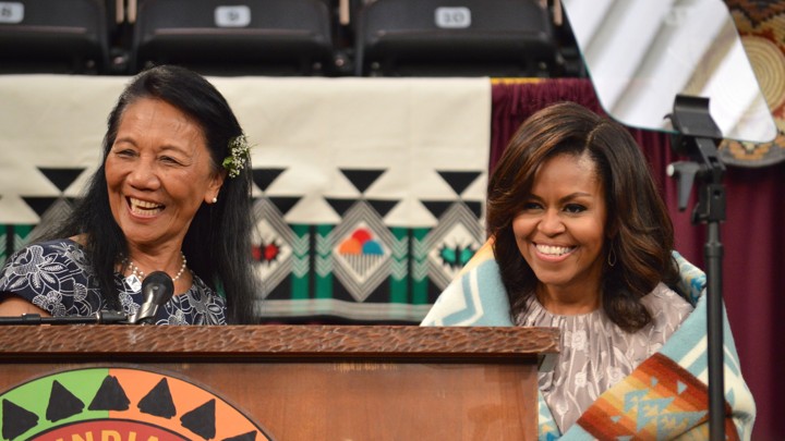 First Lady Michelle Obama is robed with a “Chief Joseph