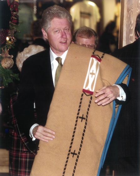 President Bill Clinton shows off the “White Buffalo Calf Woman