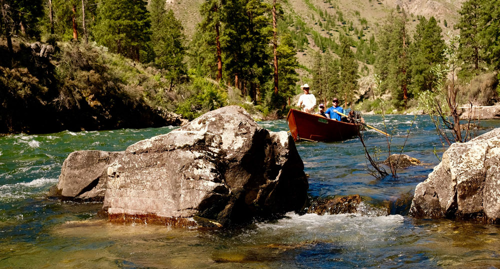 Greg Hatten and crew in Greg's wooden boat.