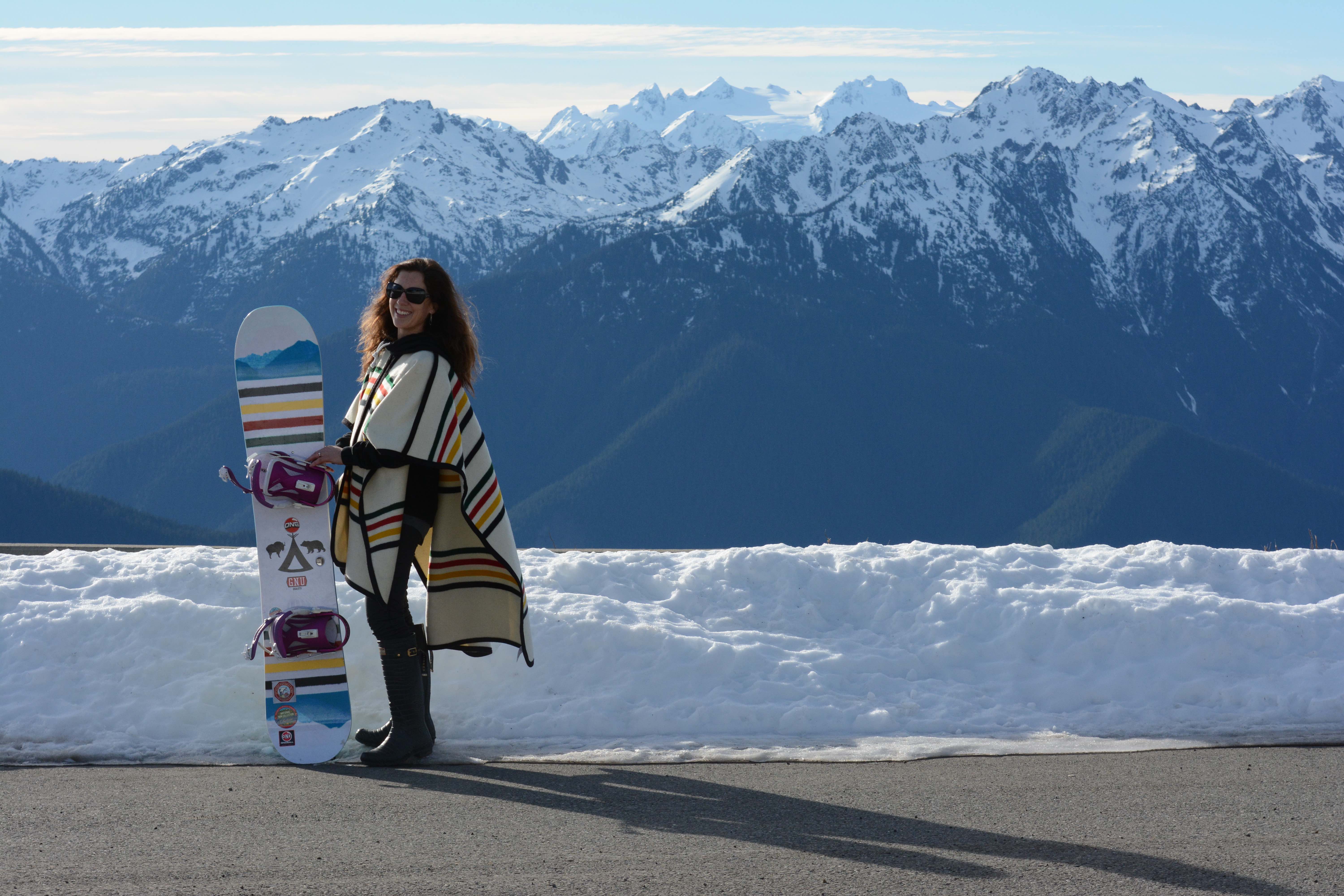 A professional women's snowboarder ar Glacier National Park. 