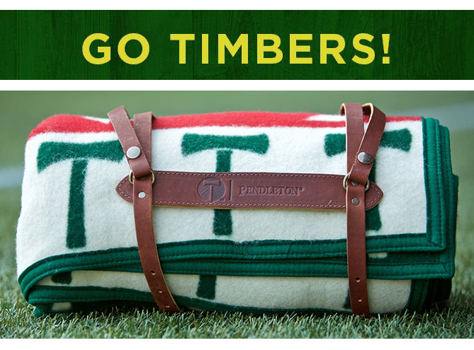 Rolled blanket, with the words "Go Timbers!"