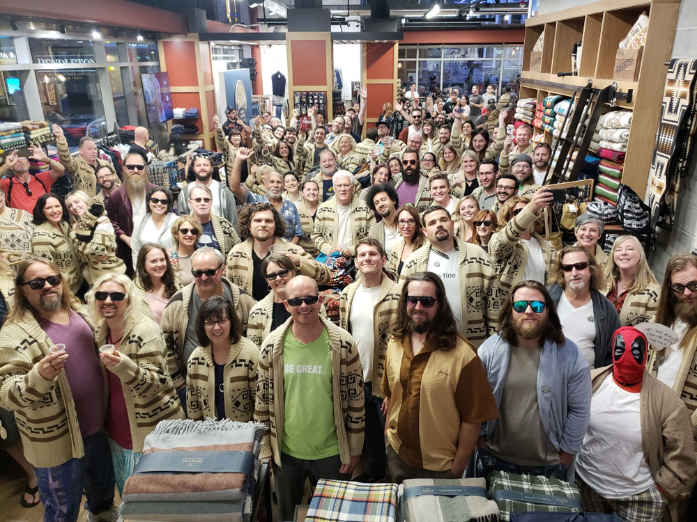 Inside the Pendleton store in downtown Portland, Oregon, a crowd gathers to show off their Westerley cardigans at a #dudecon party.